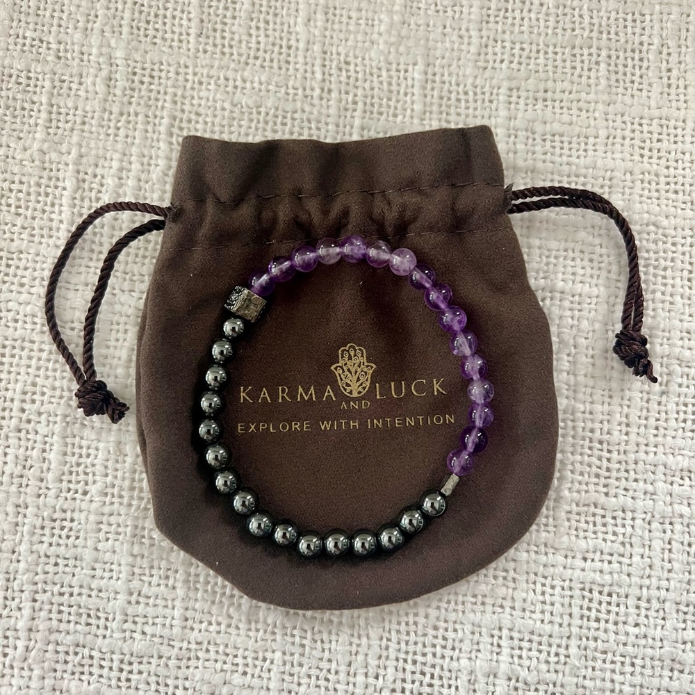 Karma and Luck Hematite Amethyst Men’s stretch bracelet with hamsa charm.